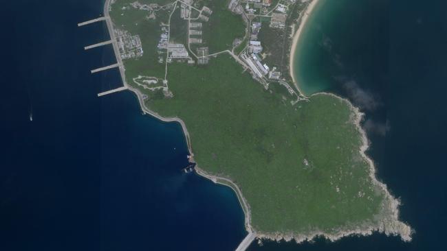 A Chinese submarine (centre, bottom) enters an underground base on Hainan Island on the South China Sea. Picture: Planet Labs