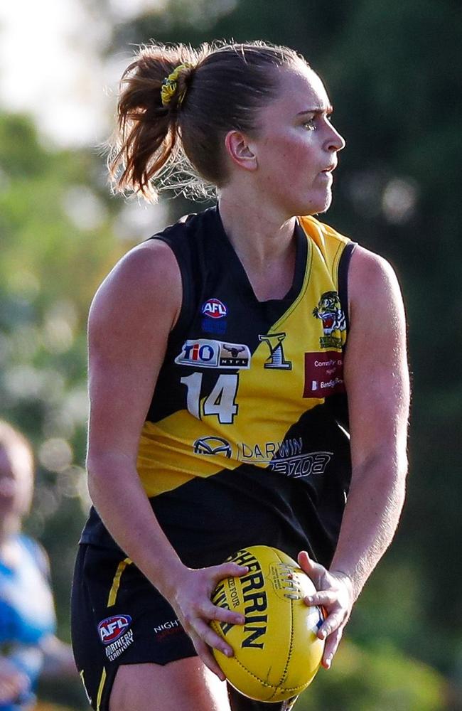 Nightcliff Tiger Gabrielle Deller with the ball (#14). Picture: AFLNT Media / Celina Whan.