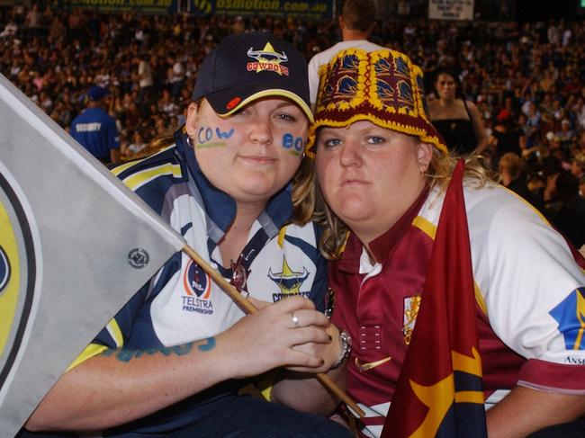 Cowboys supporter Ashleigh Kepper (21yrs, Garbutt) and Broncos supporter Shirley Holcombe (21yrs, Douglas). Picture: Lori Neilsen