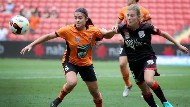 Former Brisbane fullback Angela Beard (left) is another Victory recruit. Picture: Jono Searle.