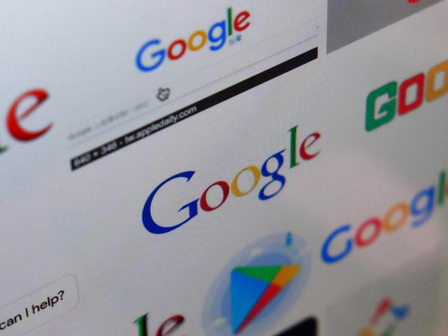 (FILES) In this file photo illustration taken on March 23, 2018 shows various Google logos displayed on a monitor in Taipei. Google on May 4, 2018 said that people looking to place US election ads on its platform will need to show identification, and make clear who is paying.Policy changes being rolled out come as online ad 'duopoly' Google and Facebook strive to avoid being used to spread misleading or divisive ads aimed at voters.
