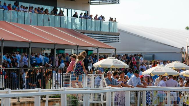 Punters watch a race from the $12m grandstand at the Darwin Turf Club. Picture: Glenn Campbell