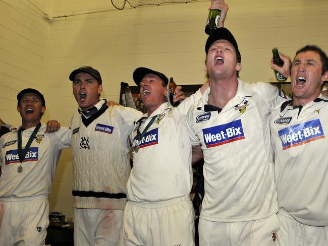 Celebrating the Sheffield Shield final win in 2010: From left, Bryce McGain, Nick Jewell, Damien Wright, Cameron White and David Hussey belt out the song.