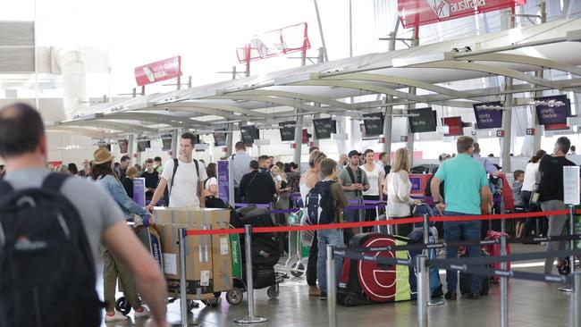 The queues at domestic check-in this morning. Picture: Christian Gilles