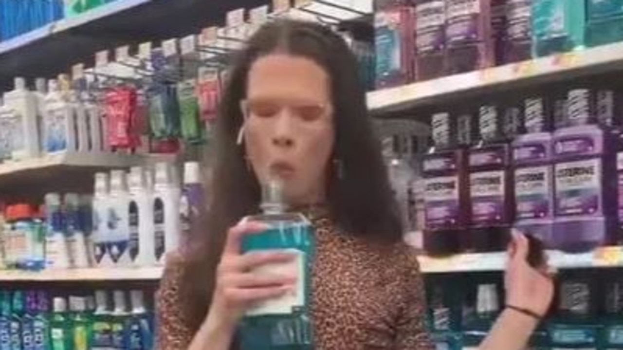 Bizarre new video of Walmart shopper gargling mouthwash and spitting it back into the bottle causes outrage in wake of ice cream licking incident