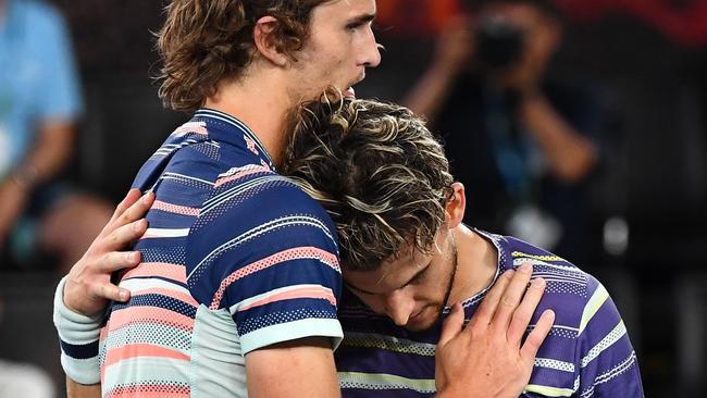 Thiem embraces German Alexander Zverev after their semi-final clash. Picture: AFP.