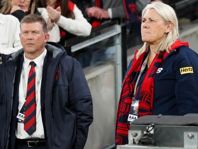 MELBOURNE, AUSTRALIA - SEPTEMBER 09: Gary Pert and Kate Roffey look dejected after a loss during the 2022 AFL Second Semi Final match between the Melbourne Demons and the Brisbane Lions at the Melbourne Cricket Ground on September 9, 2022 in Melbourne, Australia. (Photo by Michael Willson/AFL Photos via Getty Images)