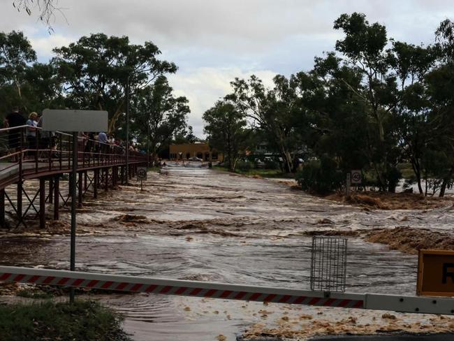 The Todd River flooded the Undoolya Rd crossing. PHOTO: Amber Chambers