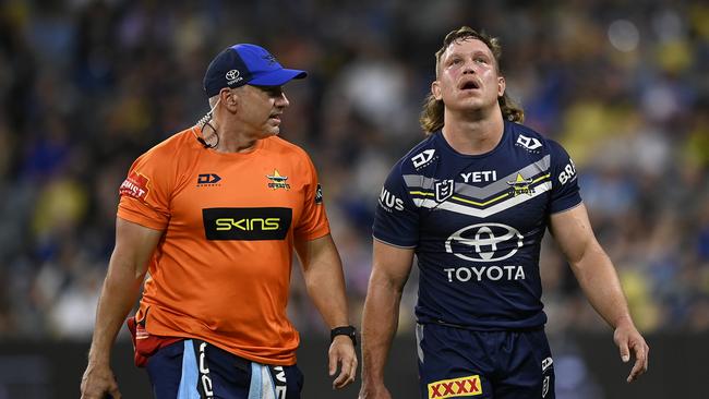 Reuben Cotter of the Cowboys comes from the field after being injured during the round 21 NRL match between North Queensland Cowboys and Cronulla Sharks at Qld Country Bank Stadium, on July 27, 2024, in Townsville, Australia. (Photo by Ian Hitchcock/Getty Images)