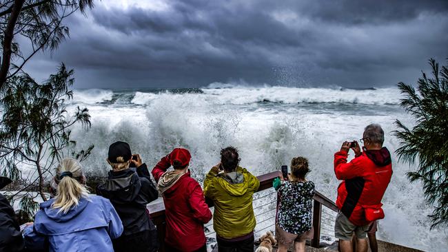 People watch the waves at Snapper Rocks. Picture: Nigel Hallett