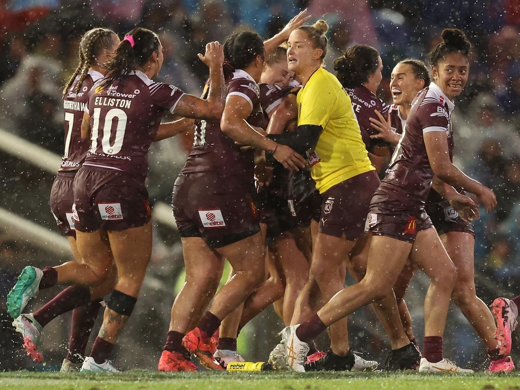 Rockhampton’s Emma Paki (right) celebrates with her Queensland teammates after their win in Game II. (Photo by Scott Gardiner/Getty Images)