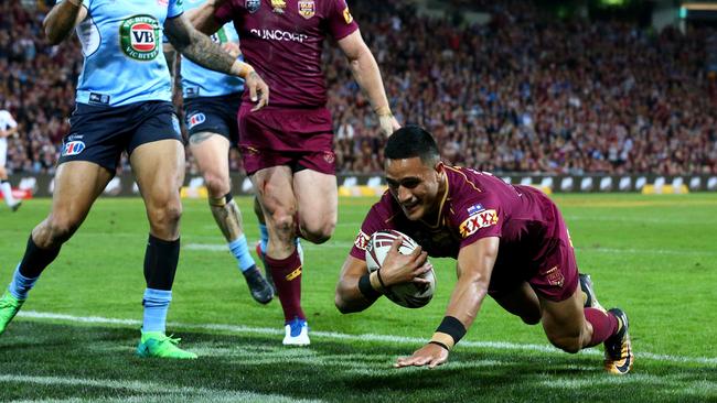 Valentine Holmes dives over for a try. Picture: Adam Head