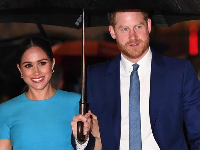 A heartbroken Prince Harry, right, comforted his wife in hospital as she recovered from a miscarriage. Picture: AFP