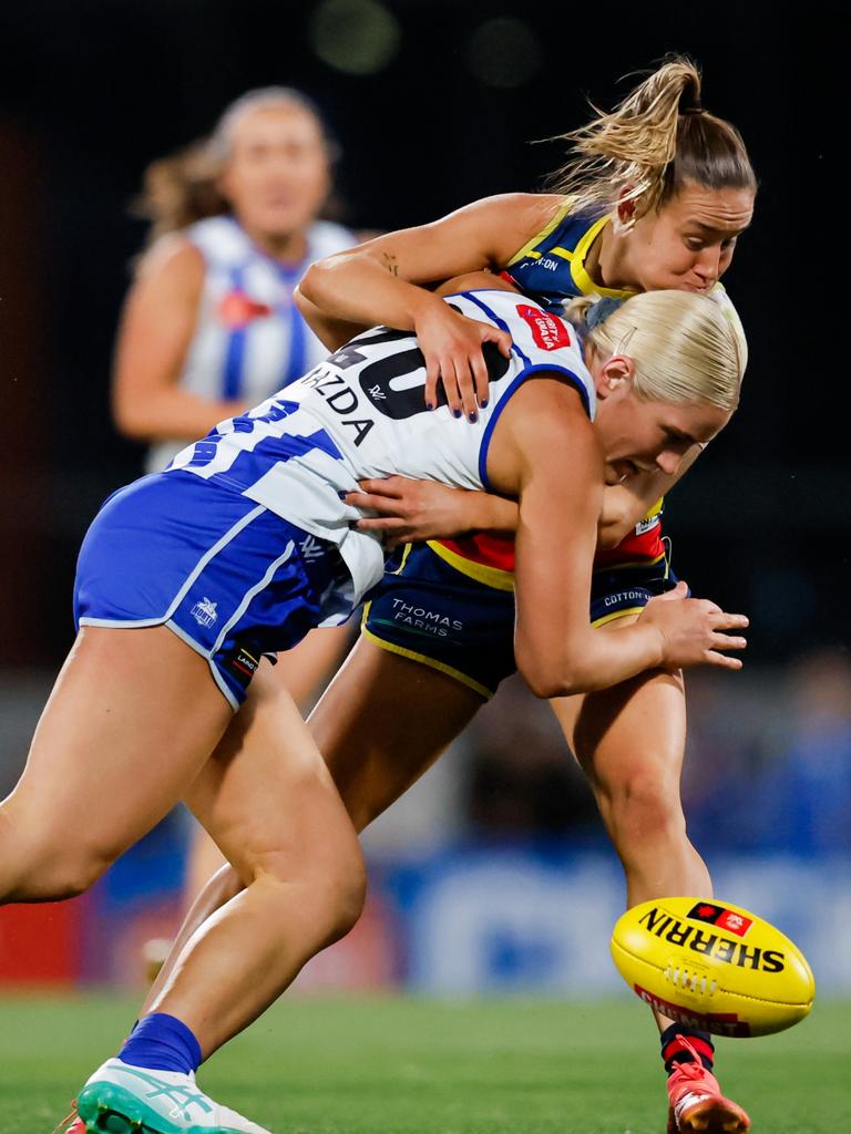 Munyard clashes with North Melbourne’s Jasmine Ferguson. Picture: Dylan Burns/AFL Photos via Getty Images