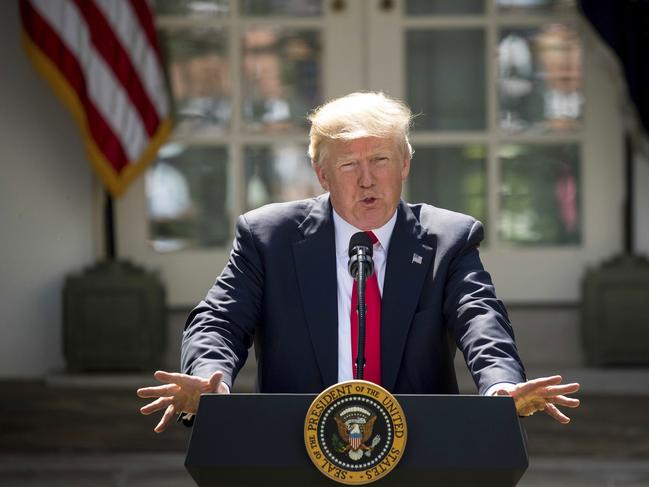 President Donald Trump speaks about the U.S. role in the Paris climate change accord, Thursday, June 1, 2017, in the Rose Garden of the White House in Washington. (AP Photo/Andrew Harnik)