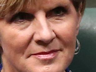 Budget 2015: Foreign Affairs Minister Julie Bishop listening to Treasurer Joe Hockey during his Budget speech in the House of Representatives Chamber, Parliament House in Canberra. Pic by Kym Smith