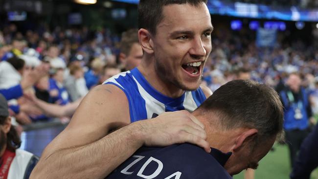 MELBOURNE, AUSTRALIA - AUGUST 03: Luke Davies-Uniacke of the Kangaroos celebrate with Alastair Clarkson, Senior Coach of the Kangaroos after winning the round 21 AFL match between North Melbourne Kangaroos and Richmond Tigers at Marvel Stadium, on August 03, 2024, in Melbourne, Australia. (Photo by Daniel Pockett/Getty Images)