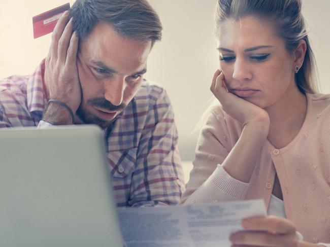 A couple having problem with bills and money. Generic relationships, laptop, expenses. Picture: iStock.