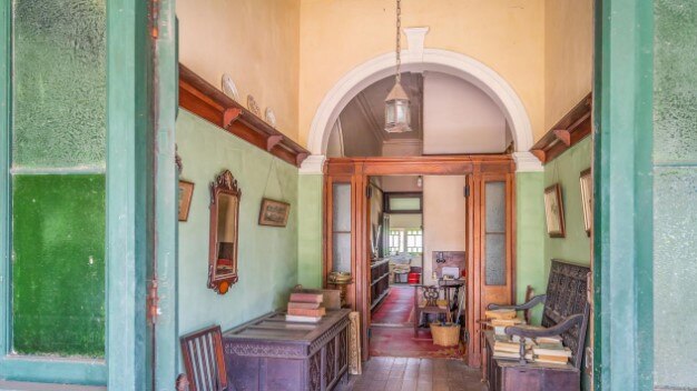 The house features huge, ornate ceilings.