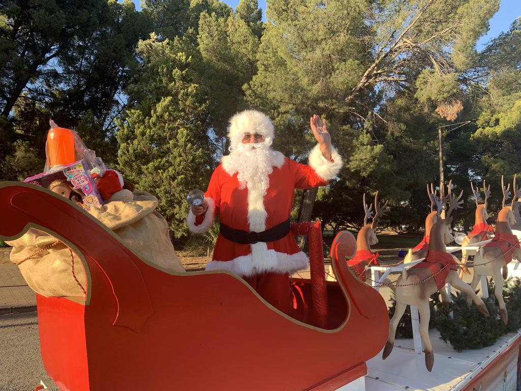 Santa was feeling the heat after making his way down from the North Pole. Picture: Isaac Selby