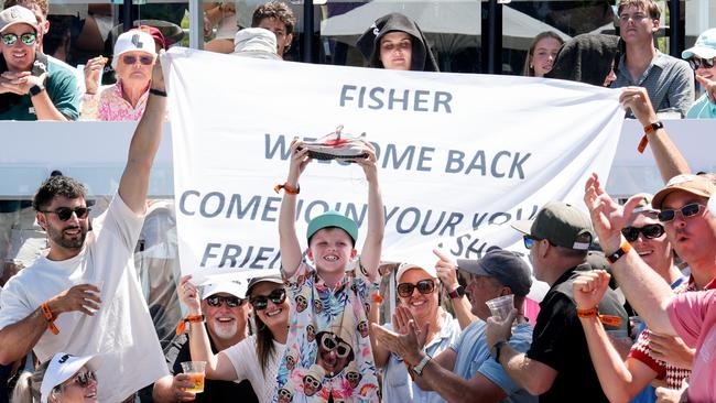 Young Fisher fan Beau Franklin, 9, was lucky enough to do a shoey with his favourite DJ. Picture: Tim Joy