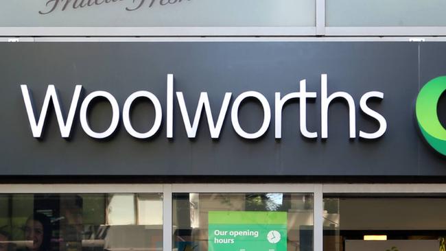 A Woolworths worker has been threatened with a knife during a daylight robbery.