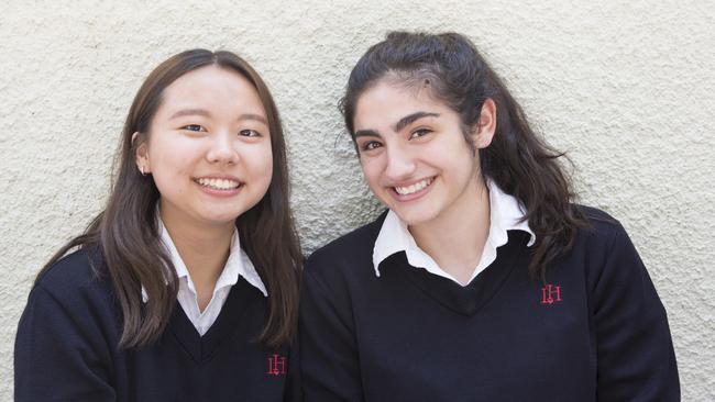 Chelina Rhee, 17, and Christina Noravian, 16, who are both juniors at Immaculate Heart High School where Meghan Markle attended in the class of 1999. Picture: Angus Mordant/NewsCorp Australia