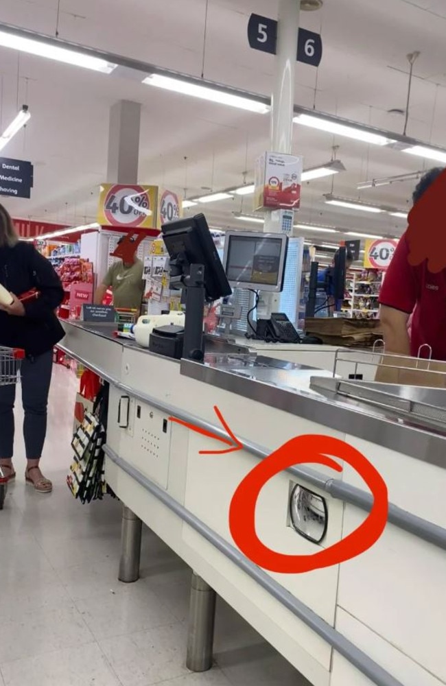 A shopper has spotted a mirror on the side of a checkout in a Coles. Picture: Reddit