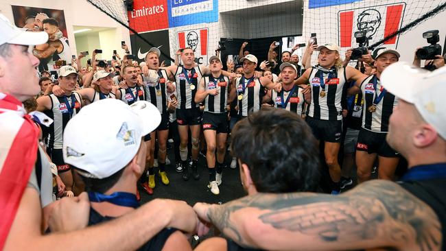 The Magpies sing the song in the rooms. Picture: Quinn Rooney/Getty Images