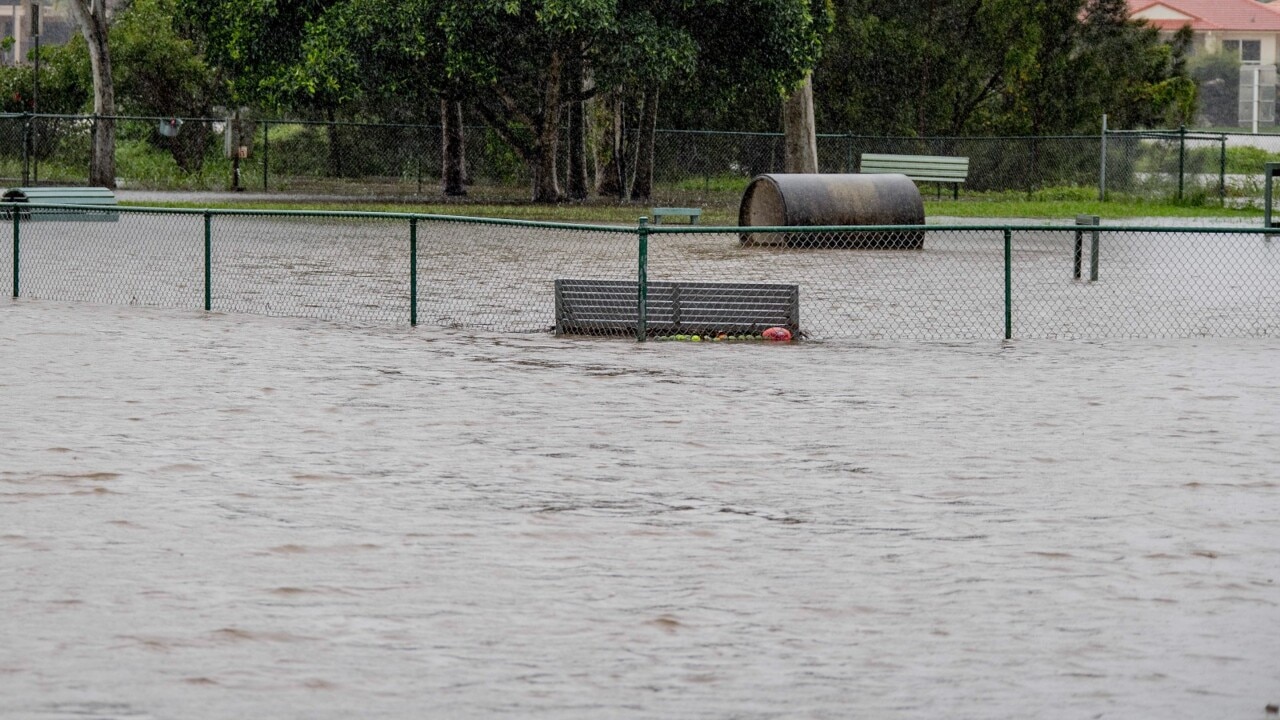 Woman found dead in Queensland floods