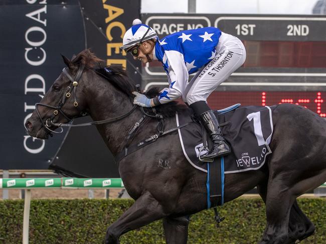 Stephanie Thornton rides The Odyssey to victory in race 7, the QTIS Jewel 3YO, during the QTIS Jewel Raceday at Aquis Park on the Gold Coast, Saturday, March 14, 2020. (AAP Image/Glenn Hunt) NO ARCHIVING, EDITORIAL USE ONLY