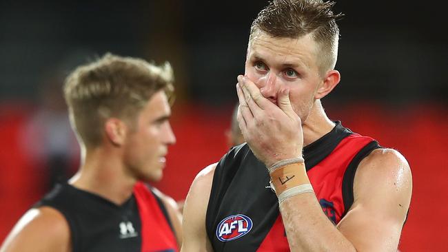 GOLD COAST, AUSTRALIA – AUGUST 07: Shaun McKernan of the Bombers looks dejected after losing the round 10 AFL match between the Essendon Bombers and the Greater Western Sydney Giants at Metricon Stadium on August 07, 2020 in Gold Coast, Australia. (Photo by Chris Hyde/Getty Images)