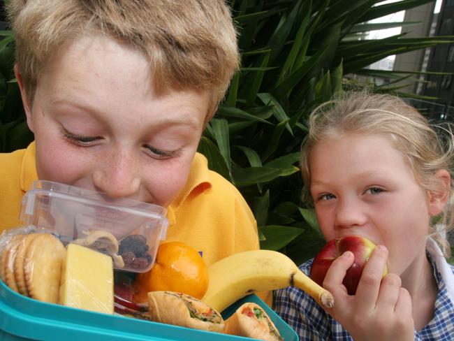 Healthy Eating Schools program launch. Sophie Uwland, 7, and Lachlan Peele, 8, of Alphington Primary School. Food. Lunchbox. Kids. Children. School lunch. Fruit. Lunch box.