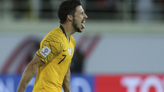 Mathew Leckie’s penalty ensured the Socceroos reached the final eight.