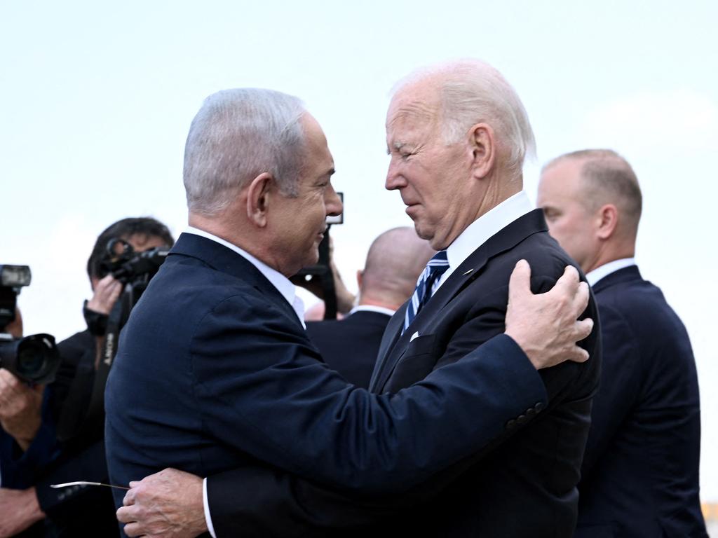 Israel Prime Minister Benjamin Netanyahu greets US President Joe Biden upon his arrival at Tel Aviv's Ben Gurion airport on October 18. Picture: AFP