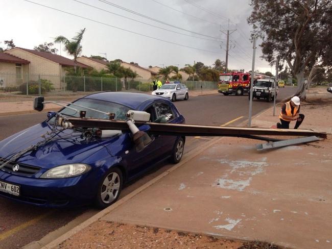 Winds over 80km/h brought down a power line on to a car in Port Augusta, SA. Picture: Lauren Rose/Southern Cross SA