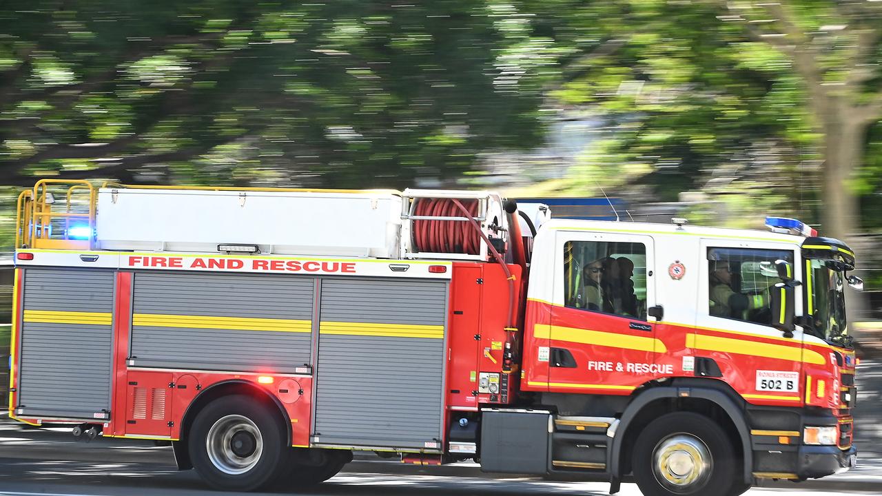 Firefighters battle fierce fire engulfing house