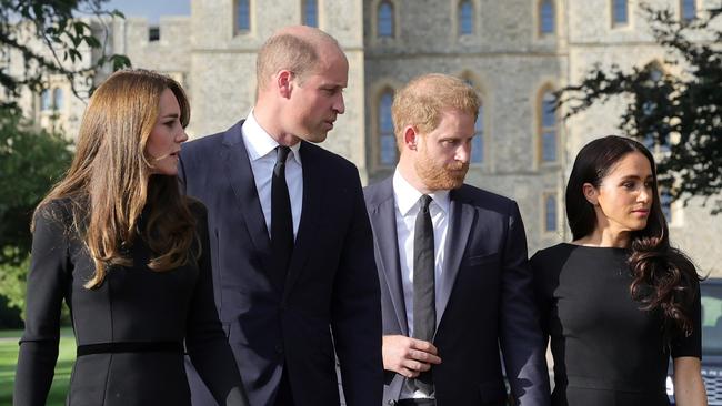 WINDSOR, ENGLAND - SEPTEMBER 10: Catherine, Princess of Wales, Prince William, Prince of Wales, Prince Harry, Duke of Sussex, and Meghan, Duchess of Sussex on the long Walk at Windsor Castle on September 10, 2022 in Windsor, England. Crowds have gathered and tributes left at the gates of Windsor Castle to Queen Elizabeth II, who died at Balmoral Castle on 8 September, 2022. (Photo by Chris Jackson - WPA Pool/Getty Images)