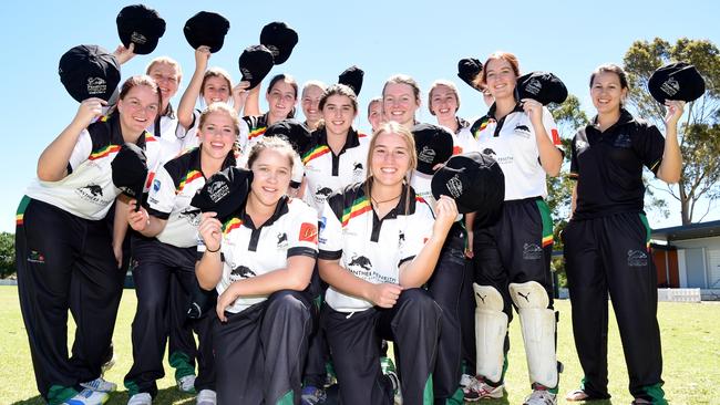 The girls celebrate receiving their baggy blacks.