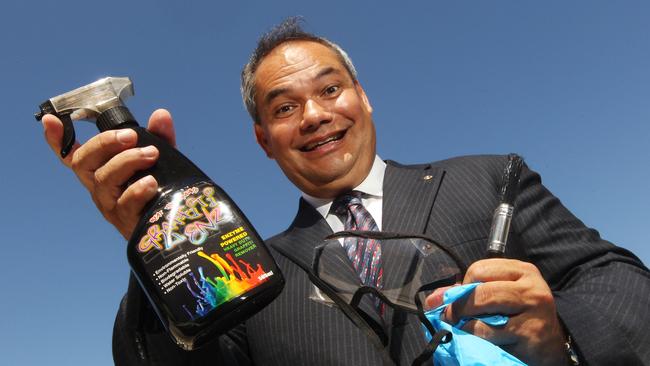 Gold Coast Mayor Tom Tate with one of the councils graffiti kits wanted to give Justin Bieber.