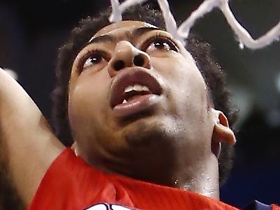 New Orleans Pelicans forward Anthony Davis (23) dunks against the Oklahoma City Thunder in the fourth quarter of an NBA basketball game in Oklahoma City, Sunday, Dec. 21, 2014. New Orleans won 101-99. (AP Photo/Alonzo Adams)