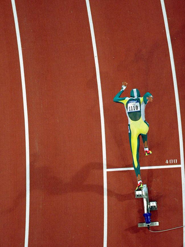 Cathy Freeman sets off on her way to gold in the Womens 400m Final at Sydney Olympic Stadium in 2000. Credit: Adam Pretty /Allsport