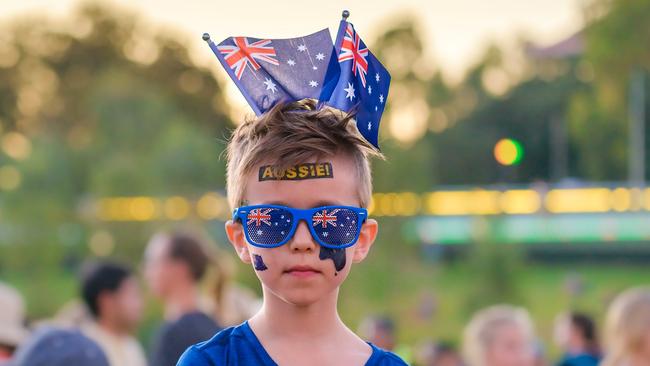 Cute Australian boy with flag tattoos on his face on Australia Day celebration in Adelaide