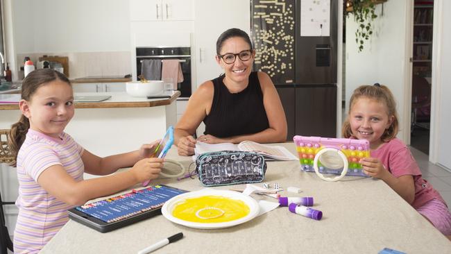 Charlotte McArthur with Vienna, 8 and Cleo, 7, who are being home-schooled on the Gold Coast. Picture: Russell Shakespeare