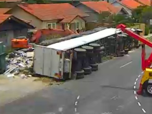 All westbound lanes of Bell St in Pascoe Vale South have been closed between Reynolds Pde and the Tullamarine Fwy after a truck rollover at the Cumberland Rd intersection. Picture: VicTraffic/X.