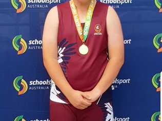 GOLD STAR: Jack Smith celebrates his national shot put victory. Smith threw 15.62m at the All Schools Championships beating his nearest rival by more 1m. Picture: Contributed