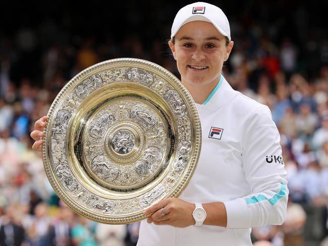 Ash Barty with the spoils of achieving her Wimbledon dream. Picture: Getty Images