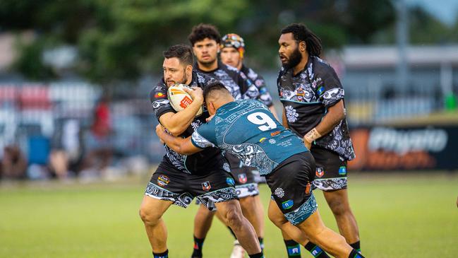 Brenton Motlop carries the ball into a tackle for the Indigenous All Stars in the 2023 Deadly Cup Carnival. Picture: Pema Tamang Pakhrin