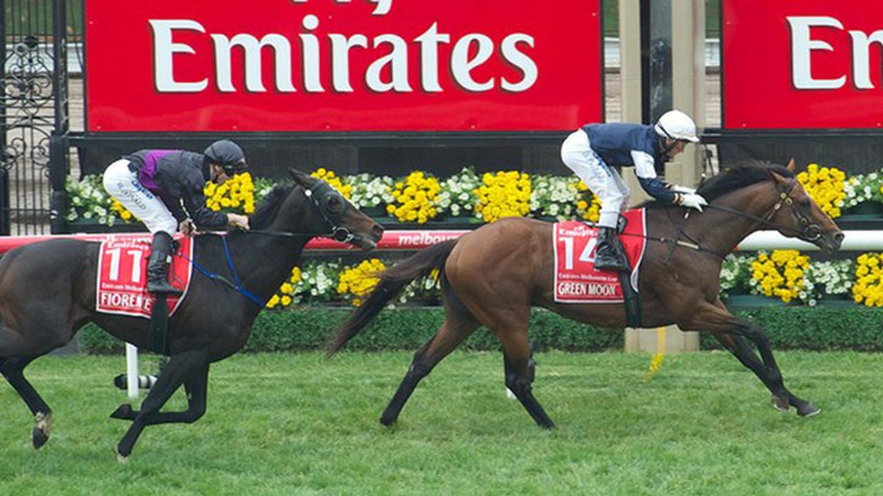 2012 Melbourne Cup winner Green Moon crosses the finish line.