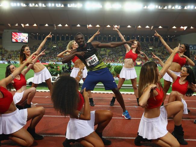 Usain Bolt struts his stuff alongside cheerleaders after victory in the men’s 100m during the IAAF Diamond League Meeting Herculis on July 21, 2017 in Monaco. Picture: Getty